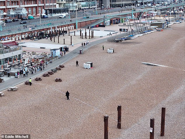 Police have cordoned off an area of Brighton beach this morning after a woman, aged in her 20s, was allegedly raped