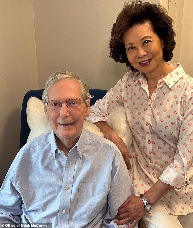 McConnell poses with Chao, his wife, in his most recent proof-of-life photo, which was released on July 27