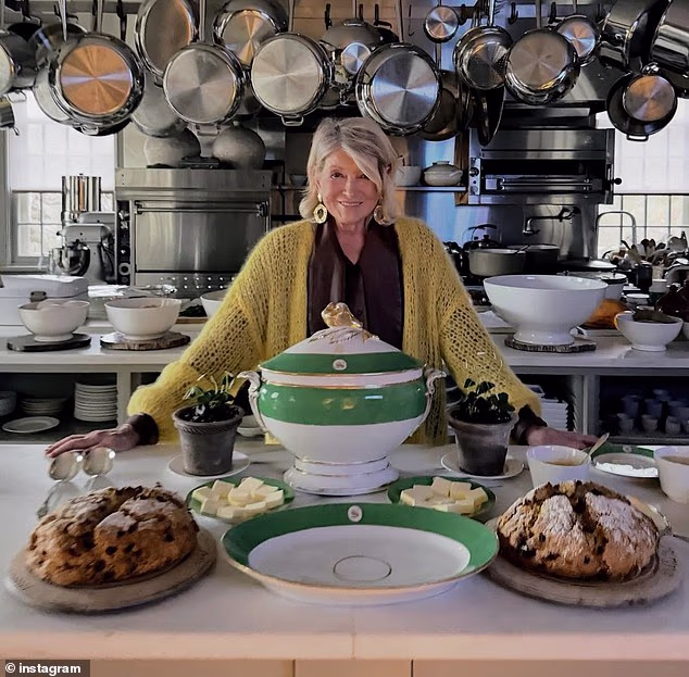 Martha Stewart (pictured in her kitchen) has claimed Meghan Markle was 'talking about' her family's trip to the UK to see King Charles while at a dinner party