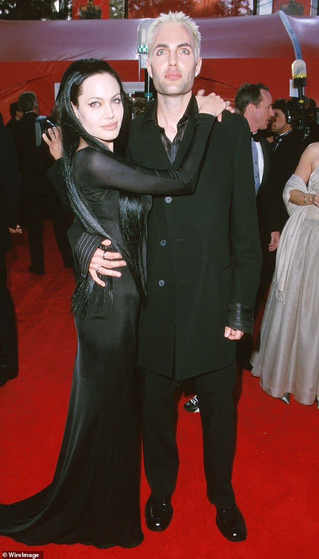 Angelina Jolie's older brother James Haven, 53, came out as gay on Thursday as he emotionally opened up about entering a 'new chapter' in his life; Haven and Jolie seen in 2000