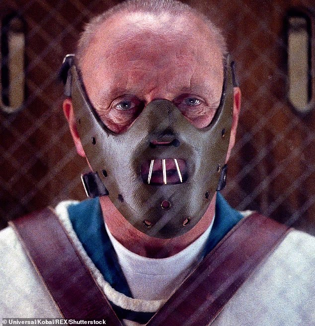 British actor Anthony Hopkins as Hannibal Lecter wearing his infamous face mask