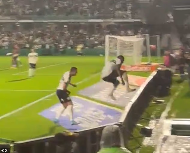 Brazilian football Jacy jumped over advertising hoardings to celebrate a goal, which was later ruled out for offside