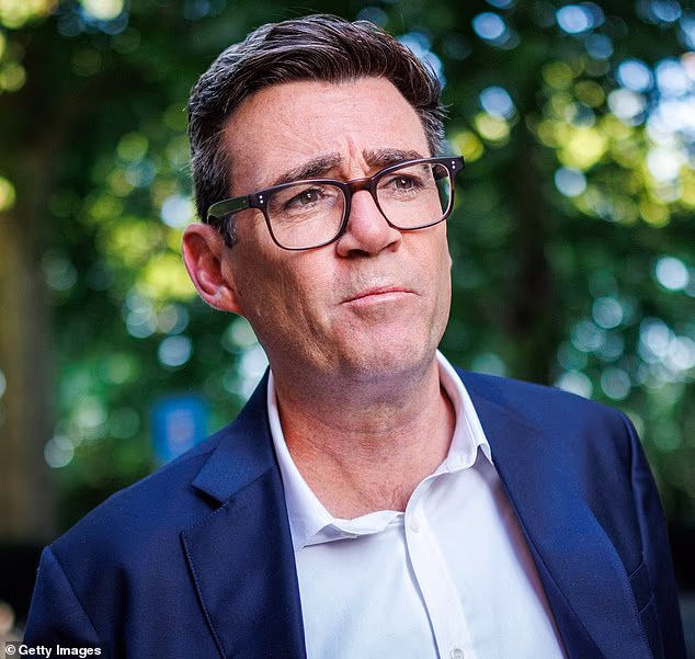 Andy Burnham leaves Millbank studios after speaking on LBC's Andrew Marr show on July 2