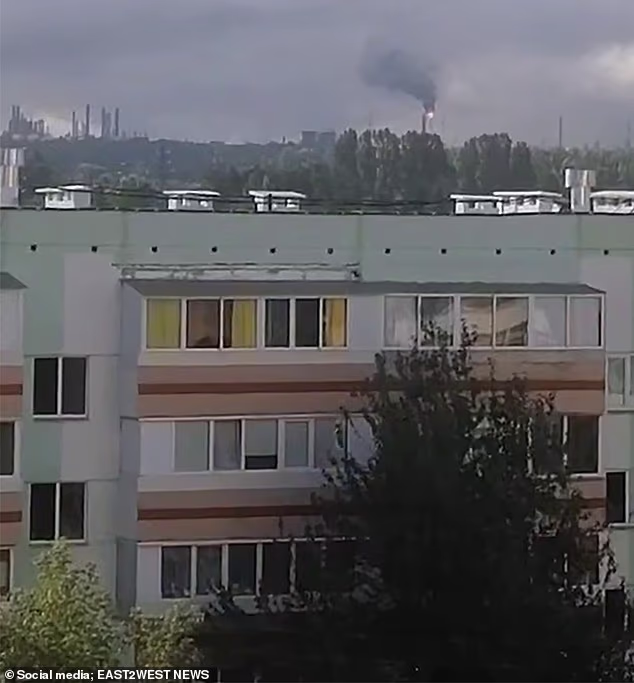 Smoke is seen rising after a Ukrainian strike on a Nizhnekamsk oil refinery in the Russian republic of Tatarstan