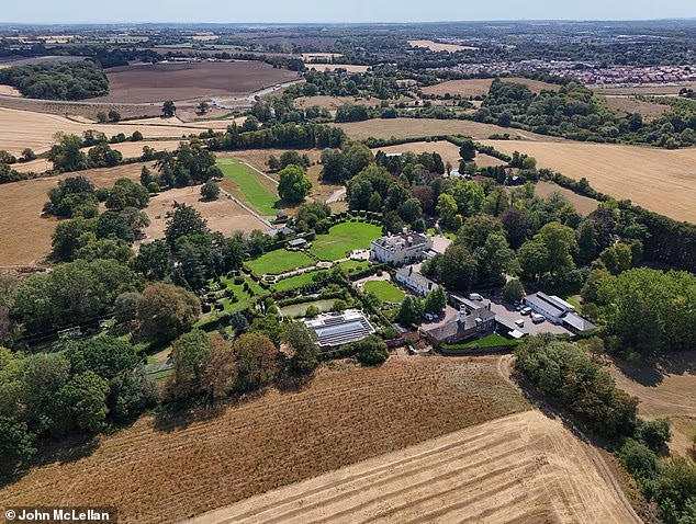 Sir Rod Stewart¿s Grade II-listed mansion has very green gardens despite the dry weather