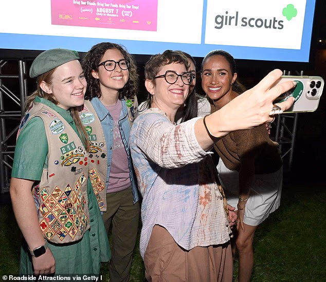 Meghan, far right, with scouts, left, and director Alysa Nahmias, second from left, at a screening in July
