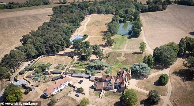 Chef Jamie Oliver's plush lawns are rather lusher than most, and the secret it easy to spot - a large personal lake just a stone's throw from the back of his Essex mansion
