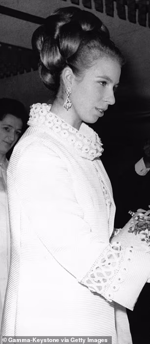 Anne debuted this ivory coat dress in 1969, when she was just 18, for the premiere of Run Wild, Run Free