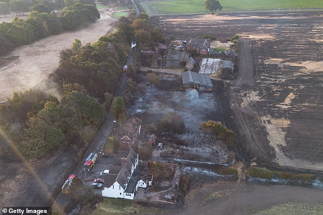 Charred land and burnt houses this morning following the huge wildfire in Stourbridge