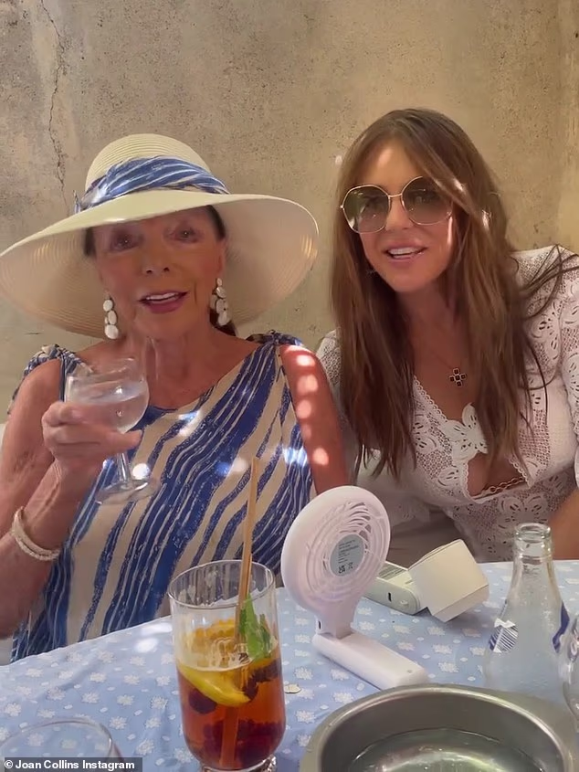 Joan Collins caught up with her friend Elizabeth Hurley in St Tropez on Friday over lunch