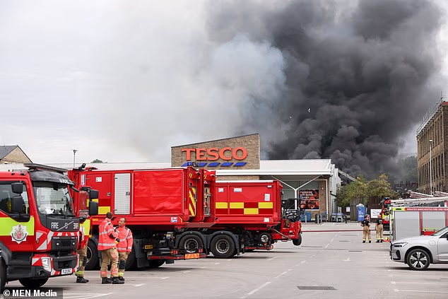 Firefighters tackling a blaze at an industrial site in Greenfield, Saddleworth, today
