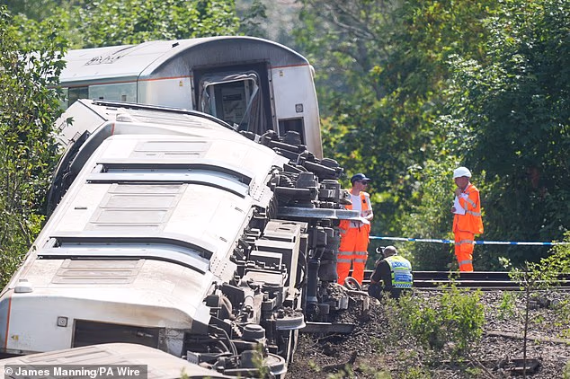 A British Transport Police scene manager and investigators at the scene near Lewes last week