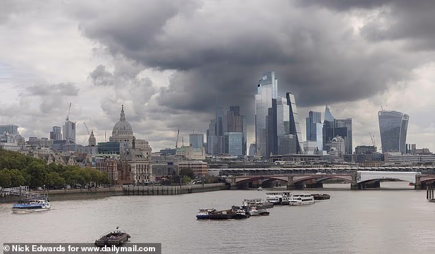 Dark clouds over the City of London this morning, as photographed from Waterloo Bridge