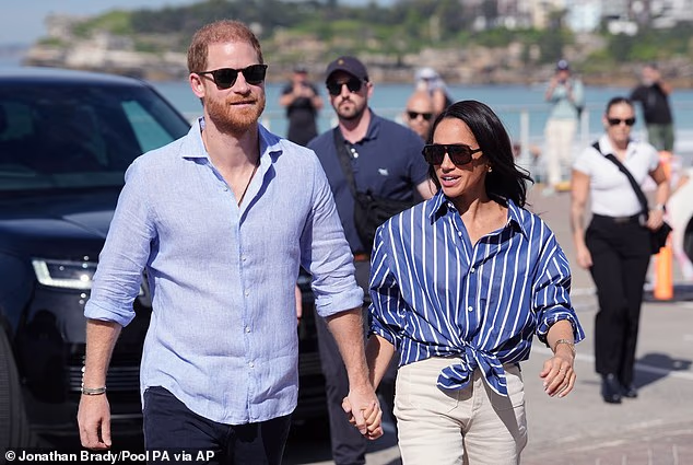Prince Harry, and Meghan, the Duke and Duchess of Sussex, arrive for an event, during a visit to Bondi Beach, Australia, April 17, 2026