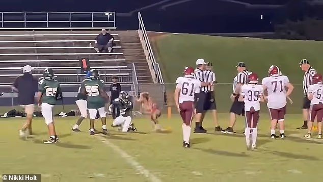 A 16-year-old girl in Tennessee is facing criminal charges after storming onto the field and tackling a middle school football player during a game on Tuesday night