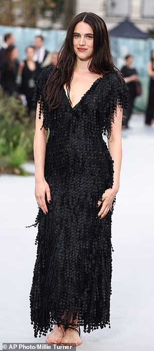 Margaret Qualley ditched both her wedding ring and her shoes as she made her first red carpet appearance since splitting from husband Jack Antonoff at the world premiere of The Dog Stars