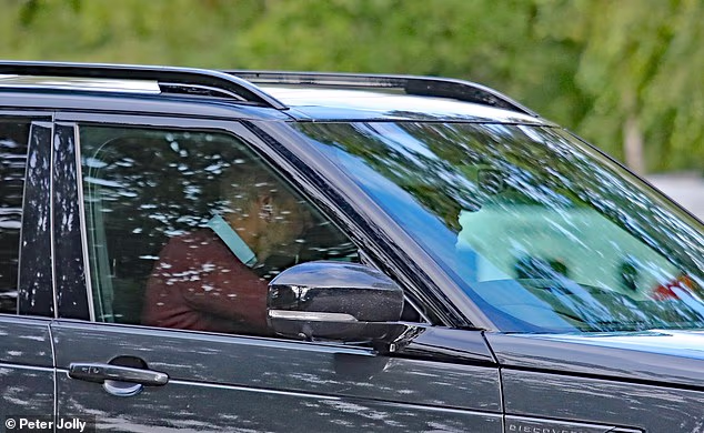 Prince William and Kate are spotted outside Balmoral in a Land Rover Discovery this morning