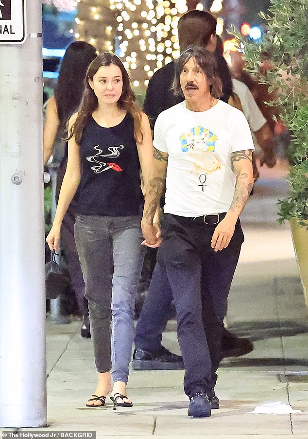 Anthony Kiedis was spotted on a dinner date with his much-younger girlfriend in Beverly Hills on Friday evening