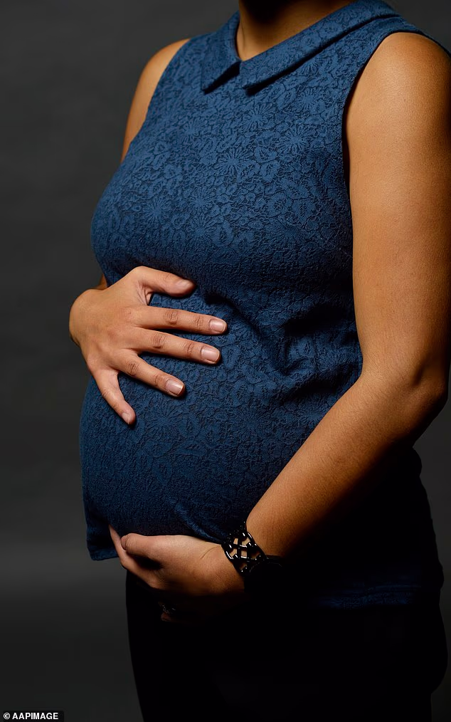 An expectant mother is in line for compensation after her colleague told her that 'nobody wants to see a pregnant woman' at work