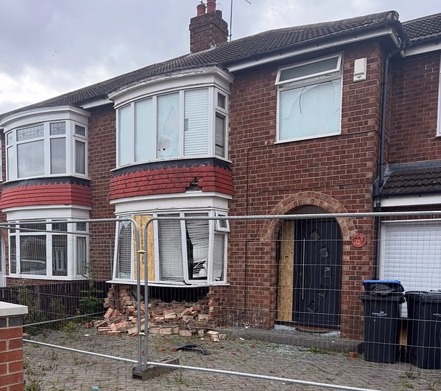 The chase was allegedly sparked by a rival gang using a Volvo XC60 to ram into the home of Cole Worthy's father at 3am on Saturday. Pictured: The extent of the damage to the property