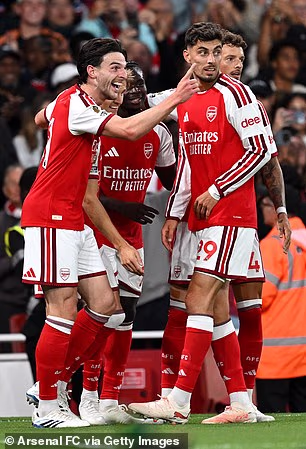 Last season's runners-up Arsenal (pictured) will face Real Madrid in one their Champions League eight fixtures to reach the knockouts