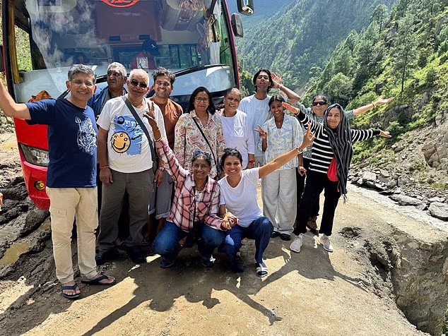A now poignant photo of an Alpine Eco Tours tour group cheerfully posing in front of their bus. The group included a girl of 13