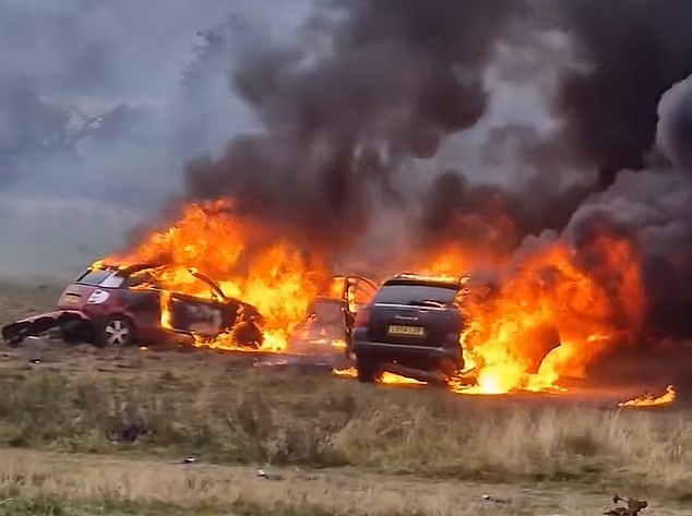 Lawless youths torch field of cars in warped tribute to victim of A66 crash: As hundreds of extra police are drafted into Middlesbrough amid fears of gang carnage, masked thugs show what they think of crackdown