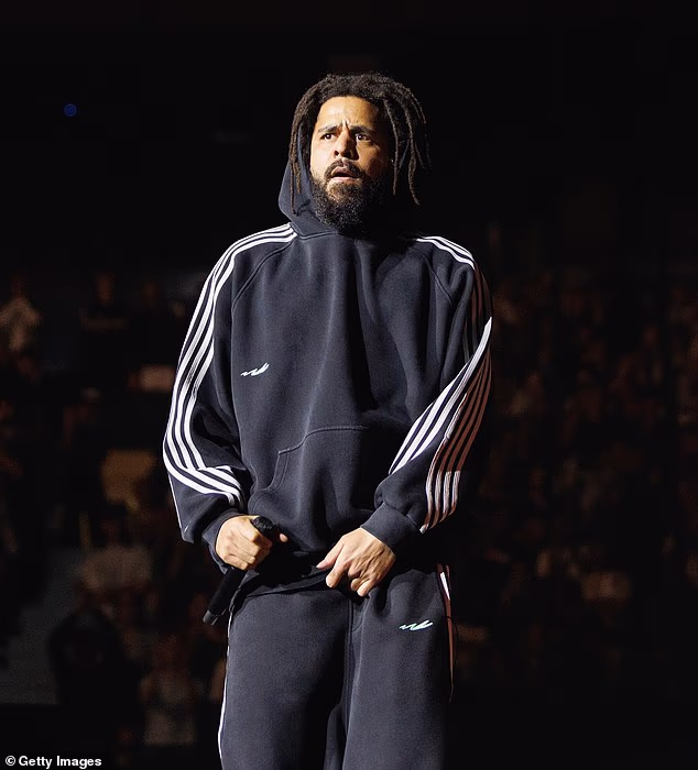 Rapper J. Cole's, 41, Sacramento concert has been cancelled after a member of his crew was killed in a horror trucking accident on Thursday morning; Cole pictured on August 24