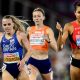Keely Hodgkinson in a crown with her coaches in the background