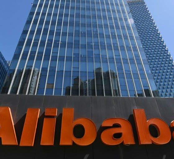 An Alibaba sign is seen outside the company's offices in Beijing