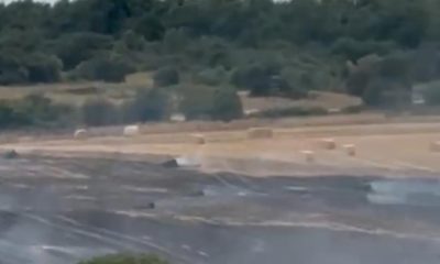 Fire crews tackle major field fire in farm in Craghead