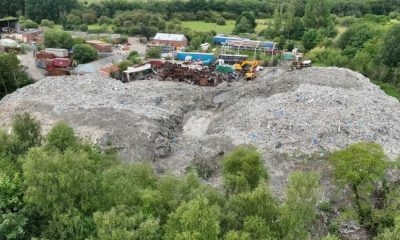 Four men arrested after alleged waste dumping at Wigan site