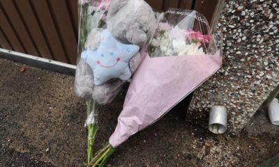 Flowers left outside Breightmet home as murder investigation continues
