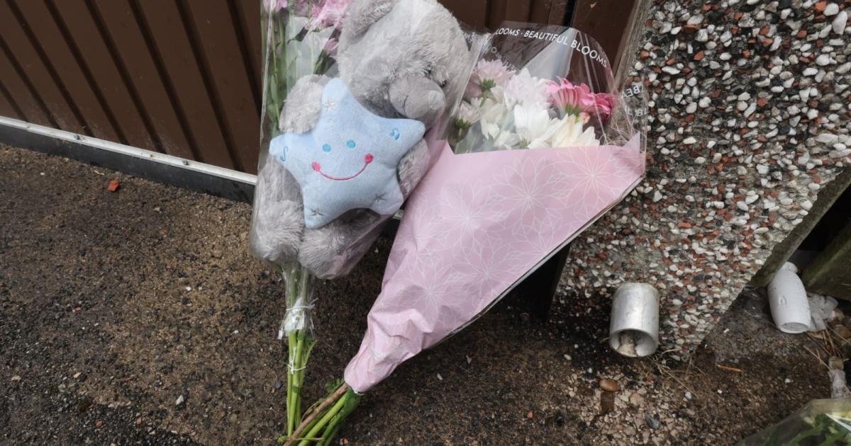 Flowers left outside Breightmet home as murder investigation continues