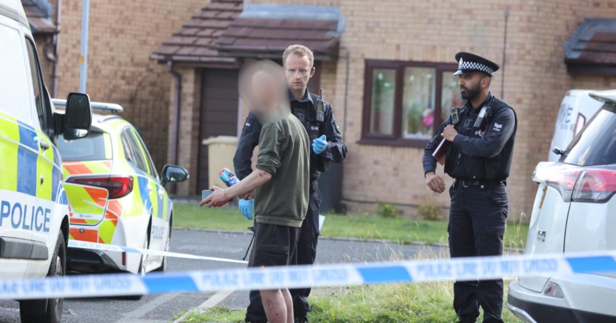 Police block off street after Halliwell 'knife' attack