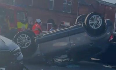 Car left overturned after crash on Russell Street, Bolton