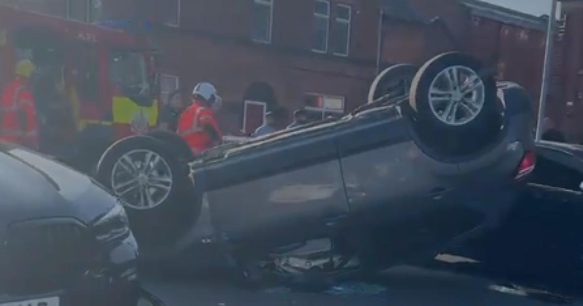 Car left overturned after crash on Russell Street, Bolton