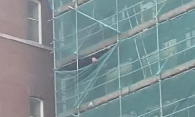 Man safely brought down after climbing scaffolding at Swan Lane Mills