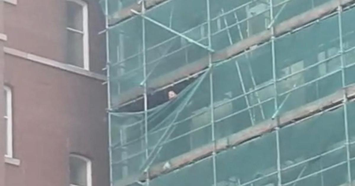Man safely brought down after climbing scaffolding at Swan Lane Mills