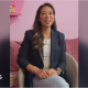 The co-founder of Little Moons, Vivien Wong smiles. She wears a blue blazer and jeans and has long, straight brown hair.