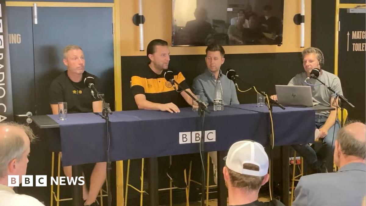 Cambridge United's director of football speaking at a fans' forum