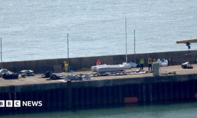 A Border Force boat with a dinghy.