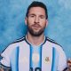 Lionel Messi poses in a photoshoot, with the index fingers of both hands pointing upwards