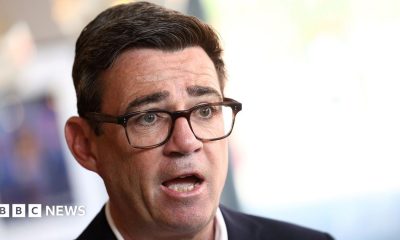 Prime Minister Andy Burnham speaks during a TV interview at The Hub cafe in Ilkeston, Derbyshire, as part of his tour of the UK.