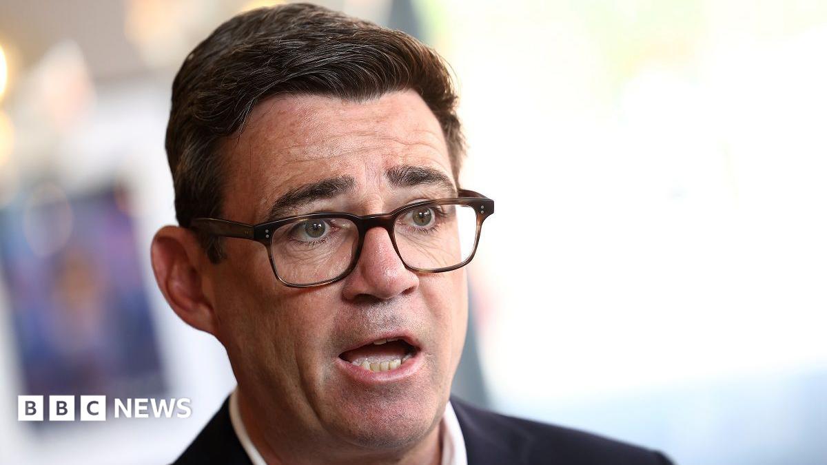 Prime Minister Andy Burnham speaks during a TV interview at The Hub cafe in Ilkeston, Derbyshire, as part of his tour of the UK.