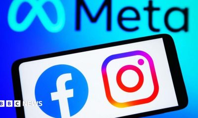 A phone screen with the facebook and instagram logos on it. In the background is the meta logo.