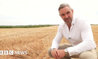 Tomos Morgan stood in a dry wheat field