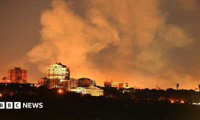 View of smoke rising from the site of damaged buildings in Kyiv.