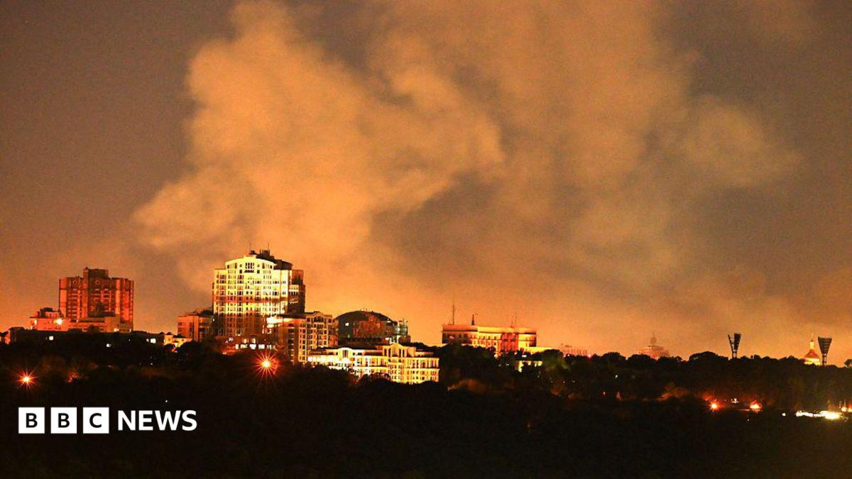 View of smoke rising from the site of damaged buildings in Kyiv.