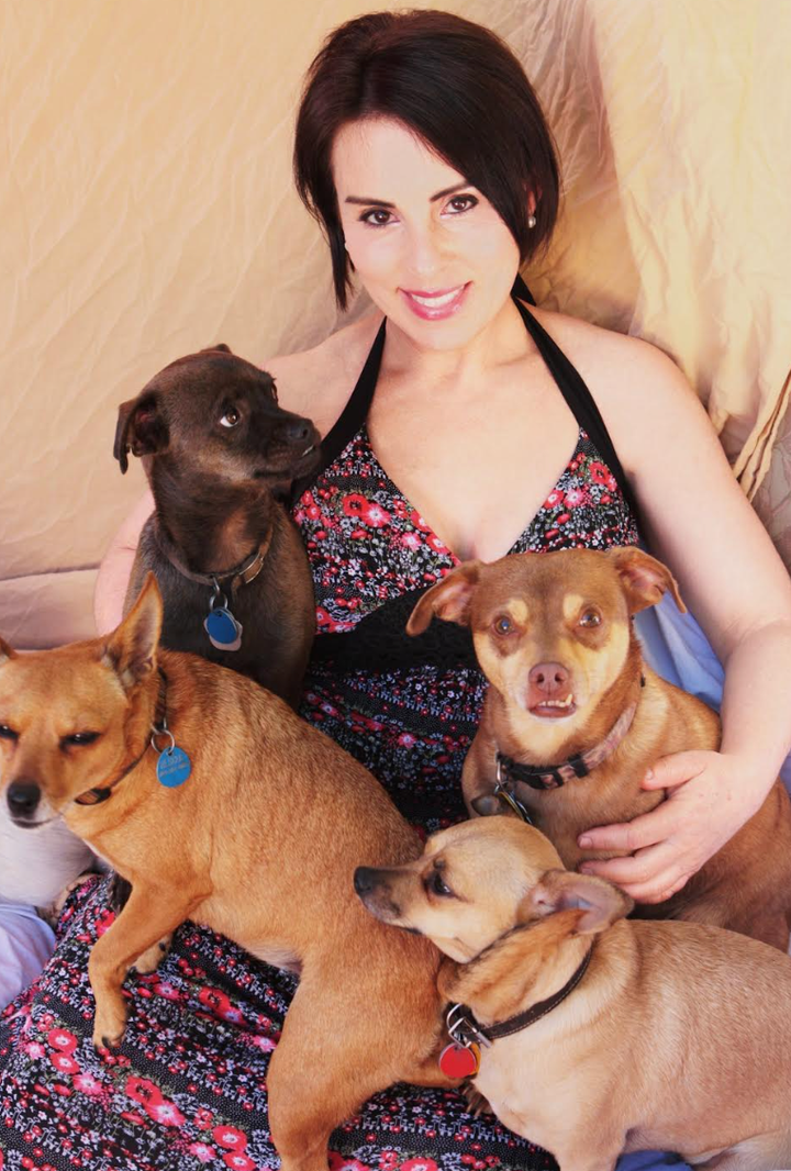 The author and her rescued chihuahuas, her favorite breed, in 2009.